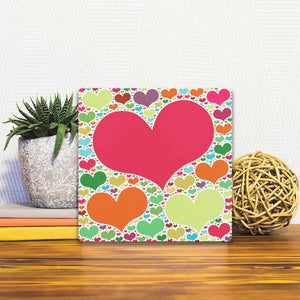 A Slidetile of the Heart Cloud sitting on a table.