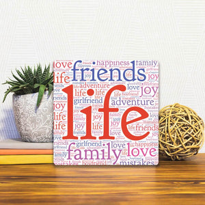 A Slidetile of the This is Life sitting on a table.