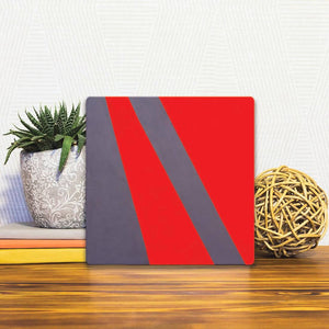 A Slidetile of the Gray and Red Rays sitting on a table.
