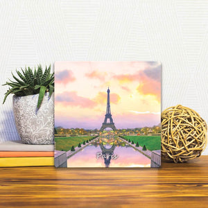 A Slidetile of the Eiffel Tower in Paris sitting on a table.