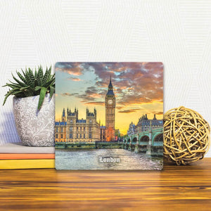 A Slidetile of the Big Ben in London sitting on a table.