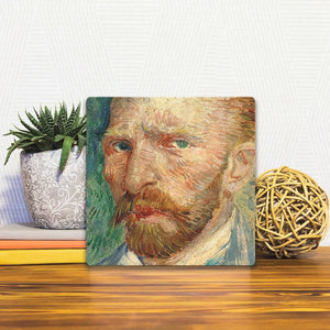 A Slidetile of the Self Portrait of Van Gogh sitting on a table.