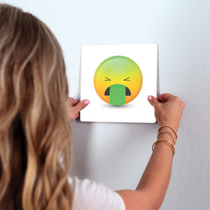 Stomach Sick Emoji Slidetile on wall in office.