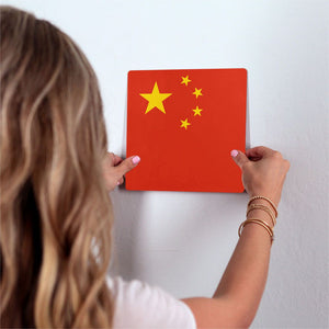 The Chinese Flag Slidetile on wall in office.