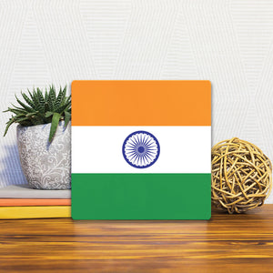 A Slidetile of the The Flag of India sitting on a table.