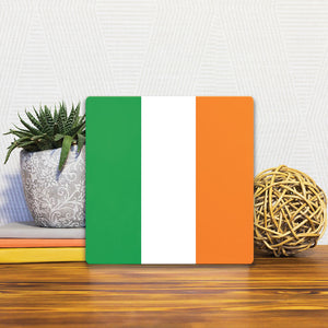 A Slidetile of the The Irish Flag sitting on a table.