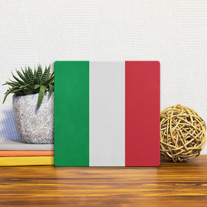 A Slidetile of the The Italian Flag sitting on a table.