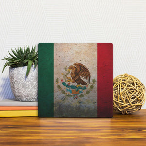A Slidetile of the The Mexican Grunge Flag sitting on a table.