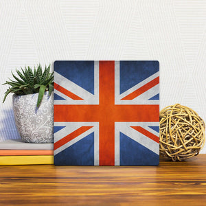 A Slidetile of the The British Grunge Flag sitting on a table.