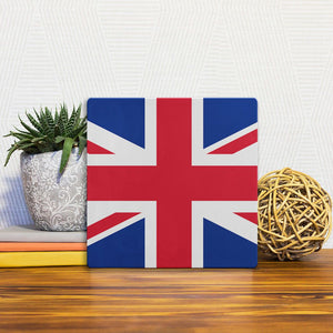 A Slidetile of the The British Flag sitting on a table.