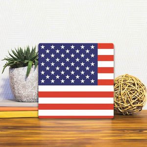 A Slidetile of the The American Flag sitting on a table.