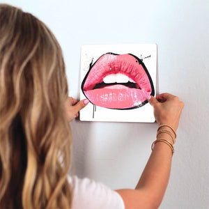 Bright Pink Lips Slidetile on wall in office.