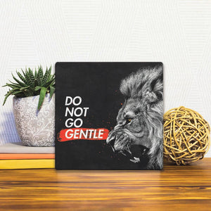 A Slidetile of the Do Not Go Gentle sitting on a table.