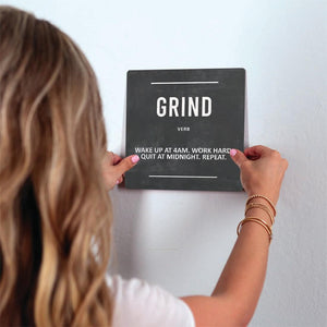 Definition of Grind Slidetile on wall in office.