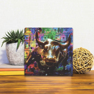 A Slidetile of the Be the Bull sitting on a table.