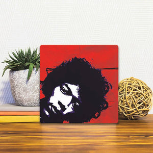A Slidetile of the Hendrix on Red sitting on a table.