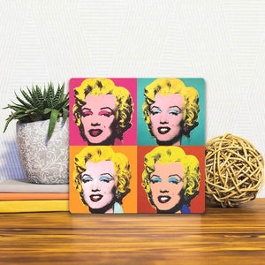 A Slidetile of the Monroe x 4 sitting on a table.