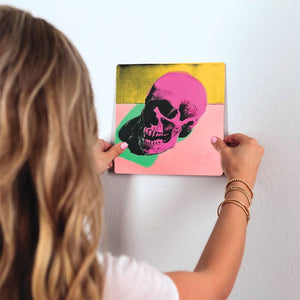 Pink Skull Slidetile on wall in office.
