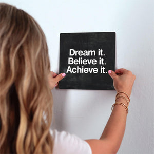 Dream It. Believe it. Slidetile on wall in office.