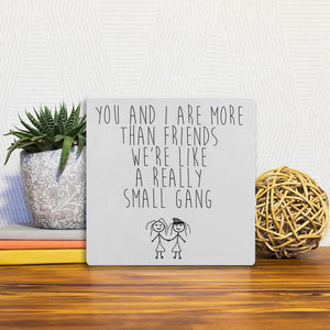 A Slidetile of the A really small gang… sitting on a table.