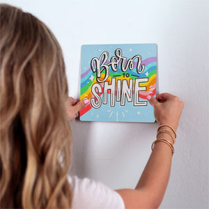 Born to shine Slidetile on wall in office.