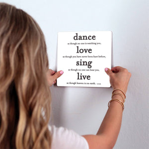 Dance, love, sing, live Slidetile on wall in office.