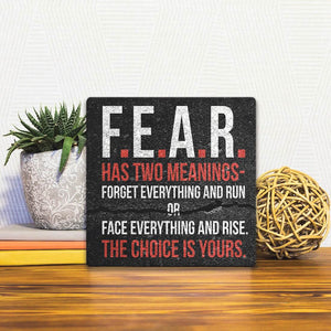 A Slidetile of the Fear has two meanings… sitting on a table.