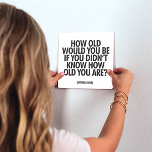 How Old Would You Be Slidetile on wall in office.