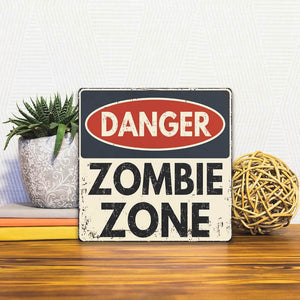A Slidetile of the Danger Zombie Zone sitting on a table.
