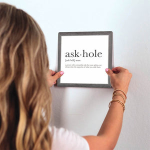 Definition of Askhole Slidetile on wall in office.