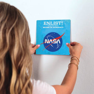 Enlist with Nasa Slidetile on wall in office.